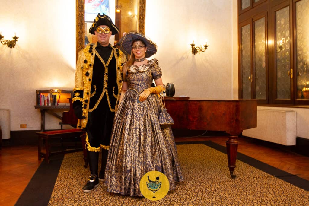 Dinner in Venice in Carnival costumes